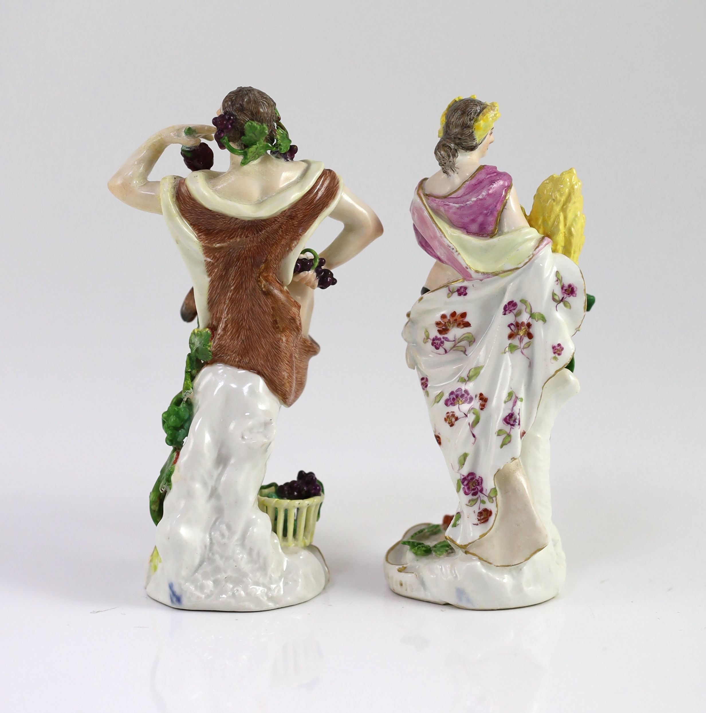 A Meissen figure of Bacchus, modelled by F Meyer and a similar figure a classical maiden holding a wheatsheaf, both mid 18th century, 14cm high, restorations (2)